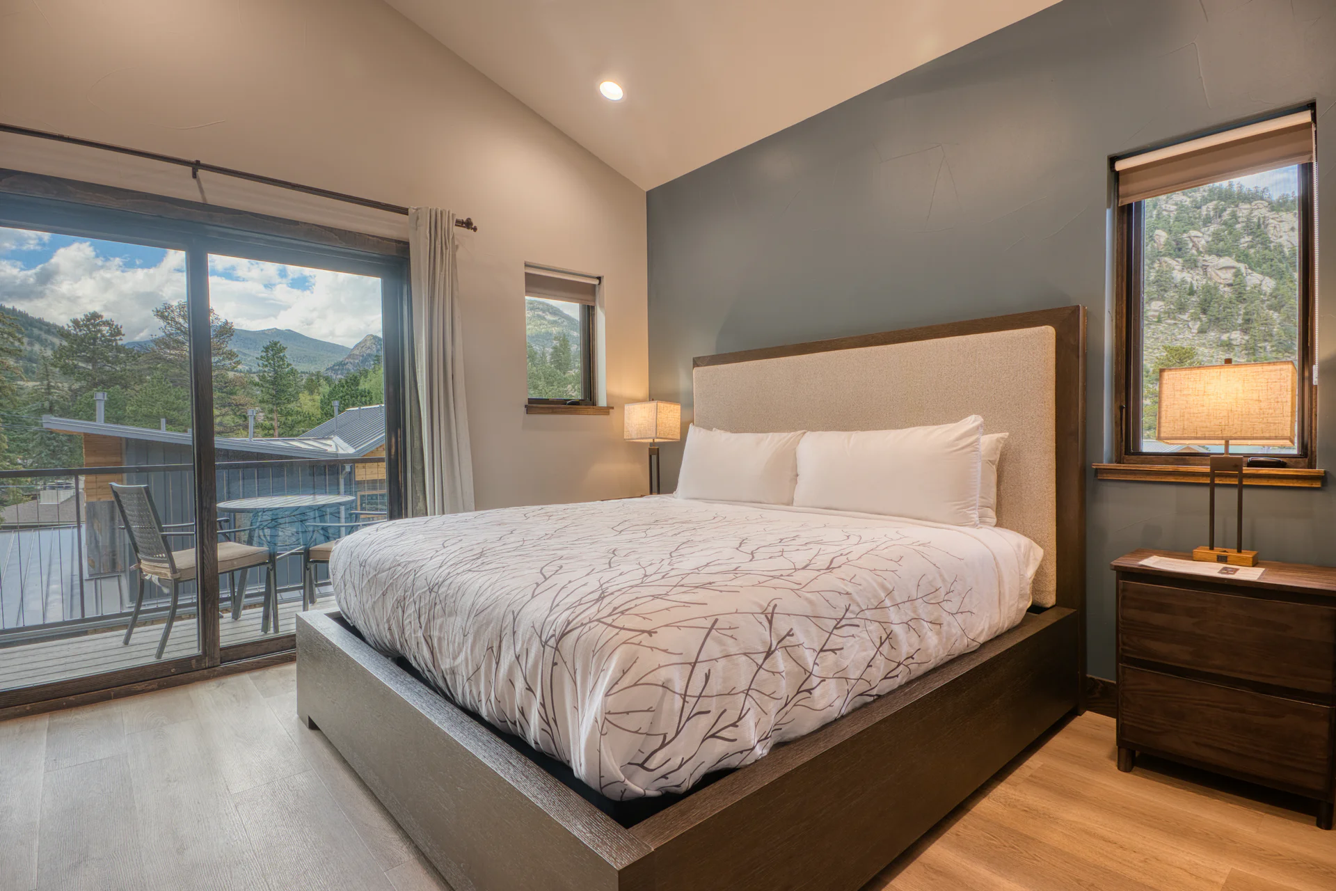 DreamView Hillside bedroom opening onto a mountain-view balcony